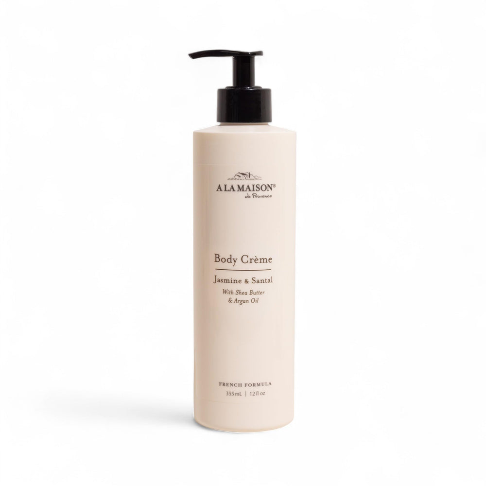 A LA MAISON Body Crème Amber bottle front, signaling rich hydration for dry skin.