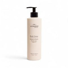 A LA MAISON Body Crème Amber bottle front, signaling rich hydration for dry skin.