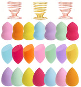 Abgream teardrop sponge blender in pink for precise cream application.