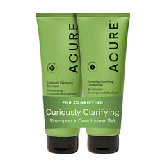 Acure Curiously Clarifying Shampoo bottle detoxifies buildup on oily hair.
