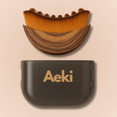 Aeki Lymphatic Contour Face Brush with soft bristles for gentle daily massage