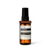 Aesop Herbal Deodorant Spray bottle close-up highlighting sage scent.