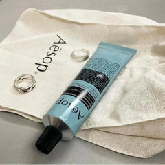 Key ingredients bergamot rind, vetiver root, and petitgrain for aromatic care