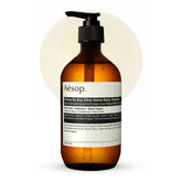 Aesop Rose Body Cleanser bottle on a bathroom shelf, gentle daily cleanse.