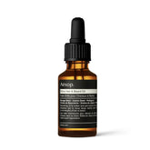 Aesop Shine Hair and Beard Oil bottle delivers silicone-free moisture for smoother texture.