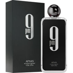 Afnan 9 PM Rebel base notes showing caramel, woods, ambergris, and musk for lasting warmth