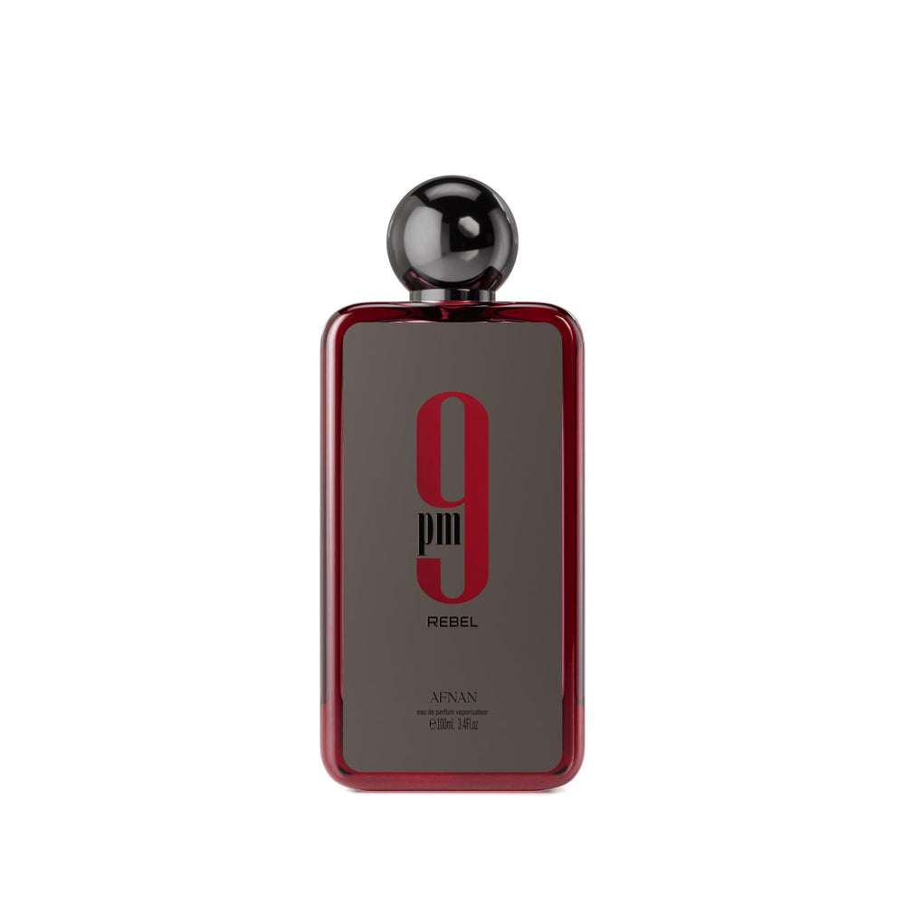 Afnan 9 PM Rebel bottle front view showing the premium fragrance centerpiece for evening wear.