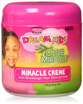 African Pride Dream Kids Olive Miracle Creme bottle highlights shine and moisture for kids' hair.
