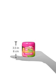 Dream Kids Olive Miracle Creme application on kids’ hair for smooth, manageable results.