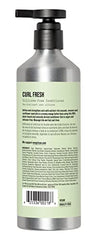 AG Care Curl Fresh Shampoo label close-up highlights natural ingredients for frizz control.