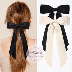 Aileam alligator clip attached to hair for quick ponytail styling.