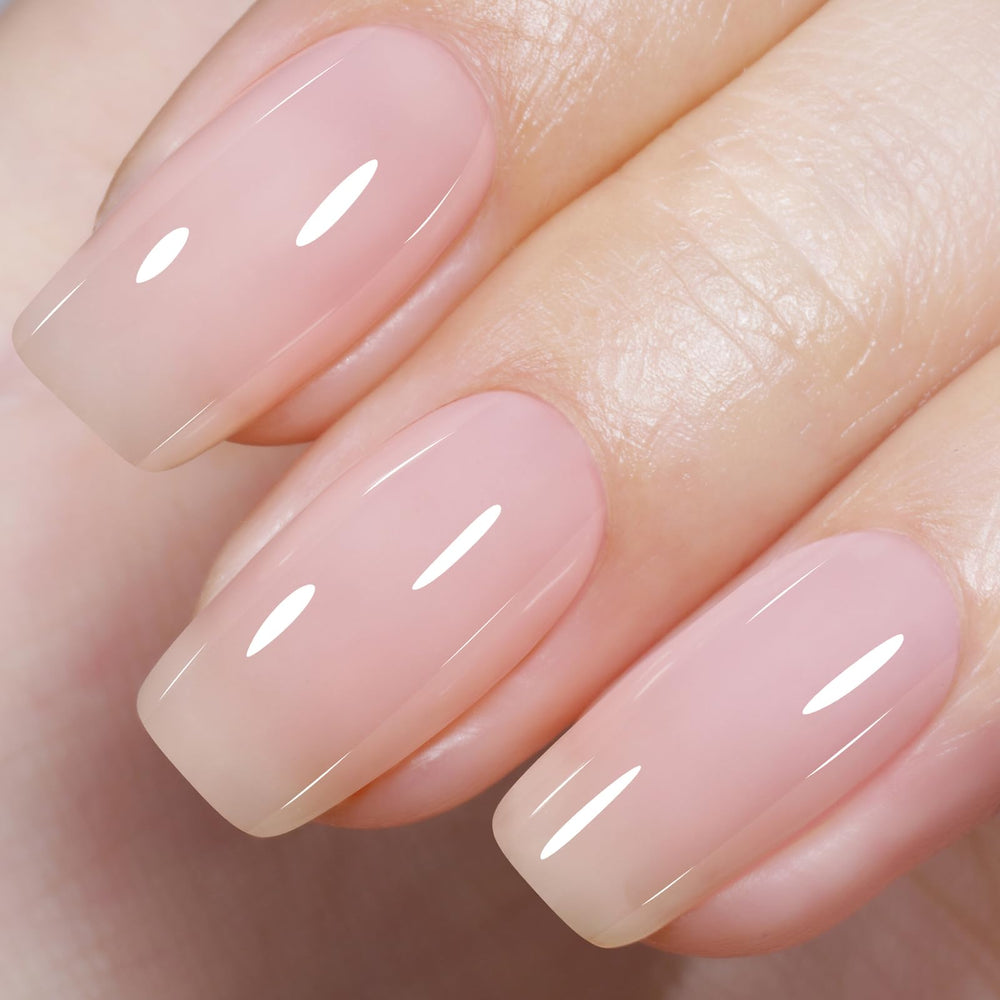 Laca AILLSA Milky Pink Nude en botella, acabado translúcido para nude suave.