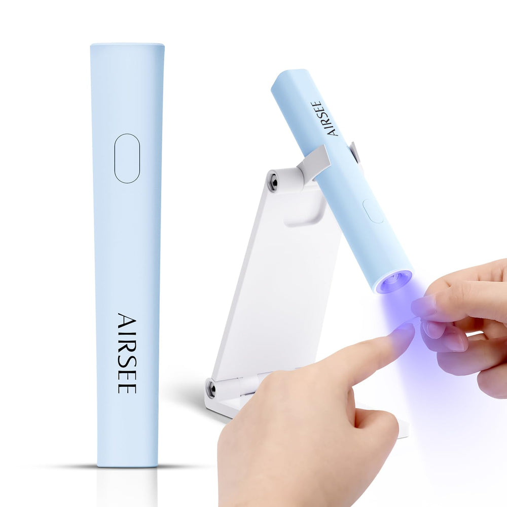 AirSEE Mini UV light on blue stand for fast, even home curing.