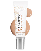 ALASTIN HydraTint Pro bottle on vanity offering daily sun protection.