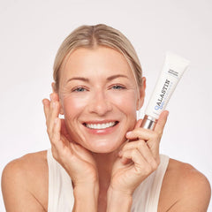ALASTIN moisturizer being applied, suggesting soothing, lightweight hydration during morning routine