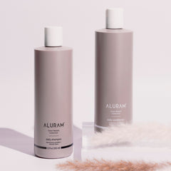 ALURAM Coconut Water Daily Shampoo creamy lather demonstrates cleansing nourishment.