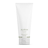 ALURAM crema suavizante con agua de coco en envase, cabello suave.