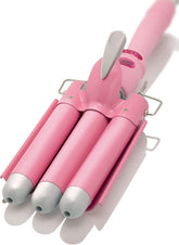 Alure three-barrel curling iron wand front view shows quick heat up and stylish white-pink finish.