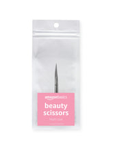 Amazon Basics Beauty Scissors with curved blades for precise grooming.