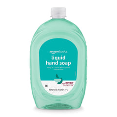 Amazon Basics refill bottle with mango coconut water scent for easy hand-cleaning at home.