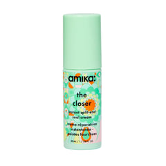 Amika The Closer bottle demonstrates instant split-end sealing for smoother hair.