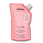 Amika Mirrorball high shine conditioner bottle highlighting glossy results