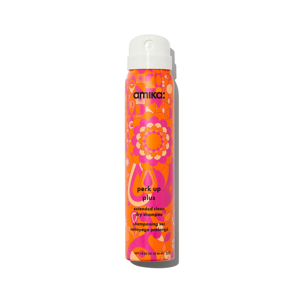 Amika Perk Up Plus, botella de champú seco con acabado invisible.