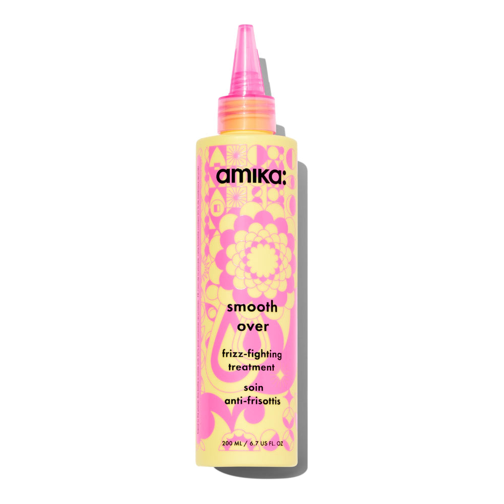 Amika Smooth Over Frizz-Fighting Treatment Mask bottle closeup highlighting frizz control.