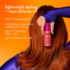 Hands dispense Amika Superfruit Star for heat protection and shine.