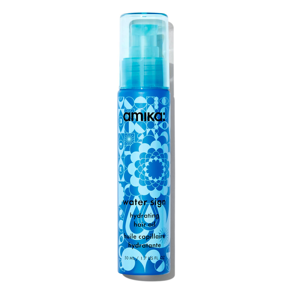 Amika Water Sign bottle pour shows precise dispensing for hydration.