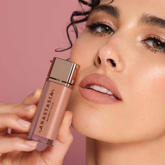 Peachy Nude Lip Velvet by Anastasia Beverly Hills on lips with even coverage