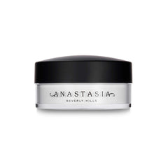 Anastasia Beverly Hills loose setting powder translucent jar close-up, smoothing and brightening the complexion.