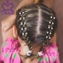 ANBALA no-slip clip with interlocking teeth for secure grip on hair.