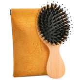 Ancable mini hair brush travel size fits in purse for quick touch-ups.