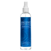 Ancient Minerals magnesium oil bottle close-up for daily skin hydration.
