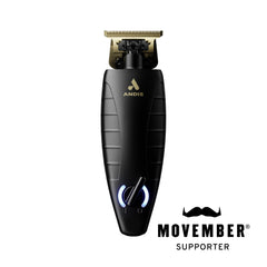 Andis GTX-EXO trimmer in hand for versatile corded and cordless grooming.