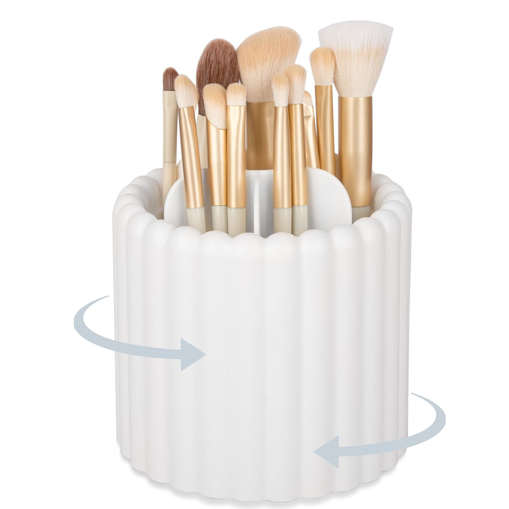 Anyoifax 360 rotating makeup brush holder with 7 slots keeps brushes neatly organized.