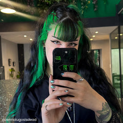 Arctic Fox Phantom Green on dark hair reveals subtle emerald tint.