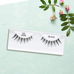 Ardell 102 Demi Black lashes on-eye look for subtle enhancement.