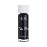 Ardell LashTite bottle close-up highlighting a low-fume, gentle adhesive for sensitive eyes.