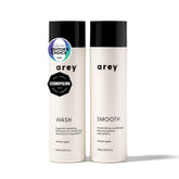 Arey Shower Duo daily wash shampoo bottle with pigment-preserving formula.