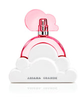 A close-up of Ariana Grande Cloud Pink bottle with a soft pink glow for long-lasting wear