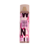 Ariana Grande Sweet Like Candy bottle pour, fruity gourmand aroma for daily wear.