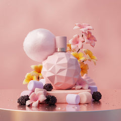Pom-pom accessory adds playful charm to the iconic bottle.