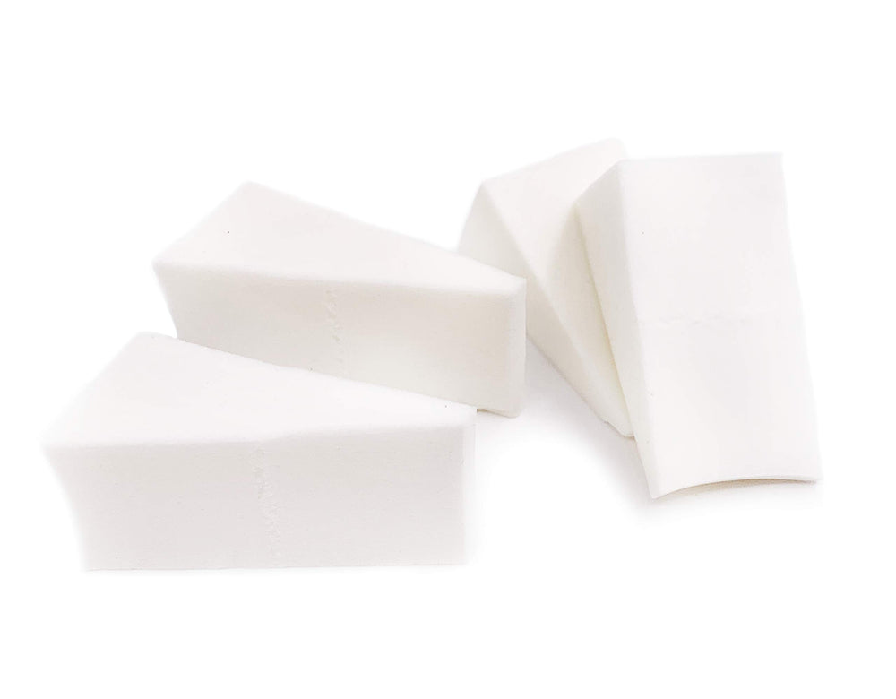Artist's Choice triangle foundation sponge for precise coverage and seamless blending.