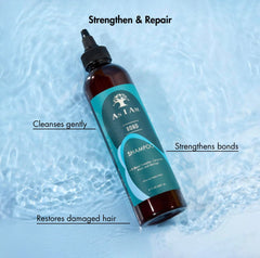 As I Am Bond Repair Shampoo, espuma cremosa que envuelve el cabello con limpieza suave.