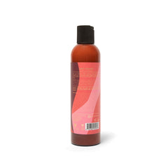 GroYogurt Leave-In Conditioner application shows creamy texture ready for styling.