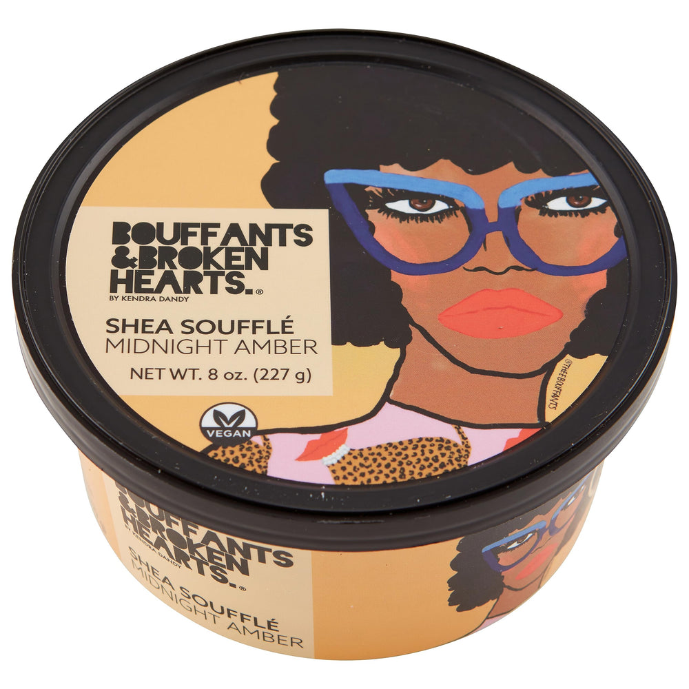 Ashanti Naturals Midnight Amber Soufflé en frasco con aroma sofisticado para cuidado corporal.