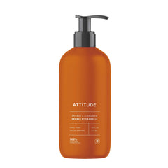ATTITUDE Jabón líquido para manos, botella naranja canela, limpieza suave y aroma festivo.
