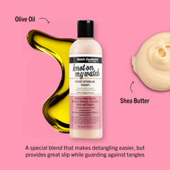 Aunt Jackie's Knot On My Watch bottle closeup highlights rich shea and olive oil benefits.